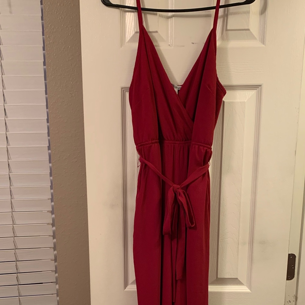 Red Stilletto’s jumpsuit with pockets. Size Large.